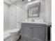 Updated bathroom with modern vanity, fixtures, and shower with glass enclosure at 527 English Sparrow Trl, Highlands Ranch, CO 80129