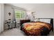 Bedroom with natural light, musical drumset and comfortable bed at 527 English Sparrow Trl, Highlands Ranch, CO 80129