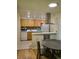Bright dining area with a round table next to the kitchen and great natural light at 9105 E Lehigh Ave # 105, Denver, CO 80237