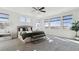 Spacious main bedroom with plush carpet and great natural light from the large windows at 953 Compass Dr, Erie, CO 80516