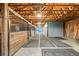 Barn interior with horse stalls and ample storage space, showing great lighting at 46093 Bristlecone Ct, Parker, CO 80138
