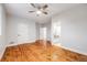 Spacious bedroom with wood floors and an ensuite bathroom at 46093 Bristlecone Ct, Parker, CO 80138