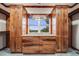The closet features a custom storage system with wooden cabinets, drawers, and shelving at 46093 Bristlecone Ct, Parker, CO 80138