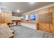 Workshop features built-in cabinets, wood counters, and pegboard wall at 46093 Bristlecone Ct, Parker, CO 80138
