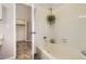 Clean bathroom with a bathtub and shower at 7725 S Cove Cir, Centennial, CO 80122