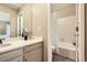 Bathroom with a vanity and shower/tub combo at 7725 S Cove Cir, Centennial, CO 80122