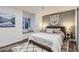 Basement bedroom with window seat and en suite bathroom at 7725 S Cove Cir, Centennial, CO 80122