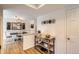 Bright dining area with hardwood floors and a charming farmhouse-style table at 7725 S Cove Cir, Centennial, CO 80122