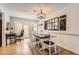 Dining room with a farmhouse table and access to backyard at 7725 S Cove Cir, Centennial, CO 80122