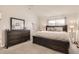 Bright main bedroom with large bed and ample closet space at 7725 S Cove Cir, Centennial, CO 80122