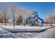 Winter playground scene with slides and swings at 7725 S Cove Cir, Centennial, CO 80122