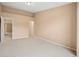 Bedroom featuring neutral carpet, a light color palette, and multiple closets at 11640 W 62Nd Pl # 203, Arvada, CO 80004