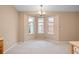 Cozy carpeted dining area with a bay window offering great natural light at 11640 W 62Nd Pl # 203, Arvada, CO 80004