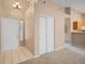 Welcoming entryway with tile flooring and closet, leads to an open space with neutral carpeting at 11640 W 62Nd Pl # 203, Arvada, CO 80004