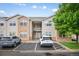Inviting multi-story townhome with brick and siding, plus reserved parking spaces at 11640 W 62Nd Pl # 203, Arvada, CO 80004