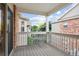 View from this spacious outdoor patio highlighting the neighborhood's architecture and lush greenery at 11640 W 62Nd Pl # 203, Arvada, CO 80004