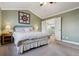 Bedroom with neutral decor, vaulted ceiling, carpet, and natural light at 1300 W 13Th Ave, Broomfield, CO 80020