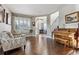 Bright living room with hardwood floors, comfortable seating, and natural light at 1300 W 13Th Ave, Broomfield, CO 80020