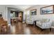 Cozy living room with hardwood floors, comfortable chairs, and stylish decor at 1300 W 13Th Ave, Broomfield, CO 80020