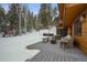 Deck with fire pit and seating area at 65 Cottonwood Dr, Evergreen, CO 80439