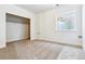 Simple bedroom with closet and neutral carpeting at 674 Penn Rd, Elizabeth, CO 80107