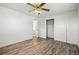 Bedroom with hardwood floors, closet and bathroom access at 7065 Ingalls Ct, Arvada, CO 80003