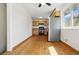 Bright kitchen with stainless steel appliances and window overlooking the yard at 7065 Ingalls Ct, Arvada, CO 80003