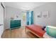 Bright bedroom with colorful accents and plenty of natural light at 3171 Fulton St, Denver, CO 80238