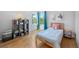 Bright bedroom with ample natural light and stylish decor, ideal for a room at 3171 Fulton St, Denver, CO 80238
