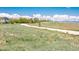 View of a biking trail winding through a neighborhood with mountain views at 3171 Fulton St, Denver, CO 80238