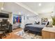 Finished basement bedroom offers stylish accents, a closet, and a modern workspace at 7264 Wembley Pl, Castle Pines, CO 80108