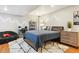 Finished basement bedroom offers a cozy and stylish place to relax and unwind at 7264 Wembley Pl, Castle Pines, CO 80108