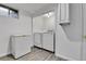 Laundry room area with washer, dryer, and freezer at 1759 Cedar St, Broomfield, CO 80020