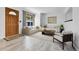 Bright living room with contemporary furniture, wood floors, and a large window offering scenic views at 1759 Cedar St, Broomfield, CO 80020