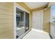 Balcony with sliding glass door, offering private outdoor space at 9434 Ashbury Cir # 203, Parker, CO 80134