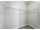 Walk-in closet with wire shelving for storage in a neutral colored room at 9434 Ashbury Cir # 203, Parker, CO 80134