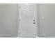 A solid six-panel front door at 9434 Ashbury Cir # 203, Parker, CO 80134