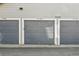 Multiple car garage doors at 9434 Ashbury Cir # 203, Parker, CO 80134