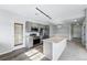 Stylish kitchen with stainless appliances and a large island perfect for entertaining and cooking at 9434 Ashbury Cir # 203, Parker, CO 80134