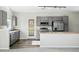 Modern kitchen with stainless steel appliances, granite countertops, and ample cabinet space at 9434 Ashbury Cir # 203, Parker, CO 80134