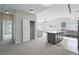 Bright, open living space flowing from kitchen, highlighting seamless transition and inviting layout at 9434 Ashbury Cir # 203, Parker, CO 80134