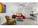 Inviting basement living area features a comfortable sofa, cozy chair, and kitchenette at 1515 Sagrimore Cir, Lafayette, CO 80026
