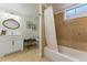 Modern bathroom featuring a tub/shower combination, vanity, and toilet at 1515 Sagrimore Cir, Lafayette, CO 80026
