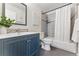 Stylish bathroom features a modern vanity, tiled shower, and neutral color scheme at 1515 Sagrimore Cir, Lafayette, CO 80026
