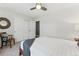 Comfortable bedroom with a ceiling fan and ample closet space for storage at 1515 Sagrimore Cir, Lafayette, CO 80026