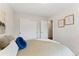 Serene bedroom with neutral colors and a large closet, ideal for relaxation at 1515 Sagrimore Cir, Lafayette, CO 80026
