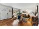 Inviting living room with hardwood floors, a bright window, and a comfortable seating area at 1515 Sagrimore Cir, Lafayette, CO 80026