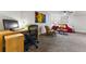 Cozy carpeted living room with stylish furnishings and a bright accent wall, perfect for relaxing or working from home at 1515 Sagrimore Cir, Lafayette, CO 80026