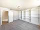 Bright bedroom showcasing custom built-in shelving and adjacent room at 441 Grey Swallow St, Brighton, CO 80601