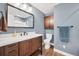 Bathroom features a modern vanity, updated fixtures, and a coordinated color scheme at 1346 S Grant St, Longmont, CO 80501